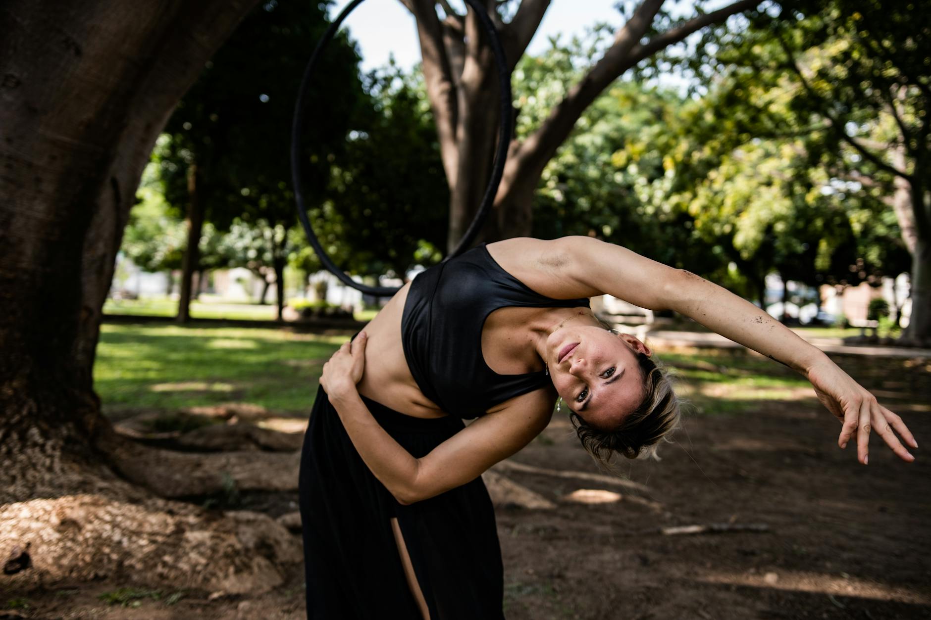 woman stretching in park
